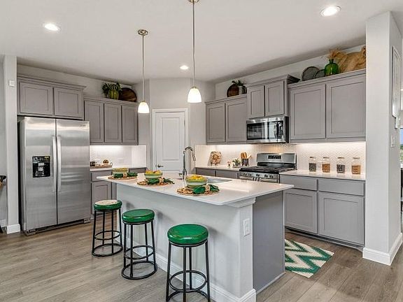 Kitchen - All Home and community information, including pricing, included features, terms, availability and amenities, are subject to change at any time without notice or obligation. All Drawings, pictures, photographs, video, square footages, floor plans, elevations, features, colors and sizes are approximate for illustration purposes only and will vary from the homes as built.