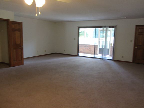 Living/Dining area facing screened porch