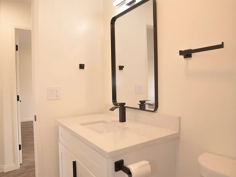 All new bathroom with quartz countertop