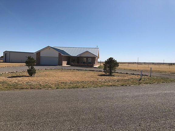 2 Acres Fenced Back Yard