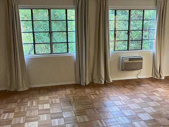 Nice living room space; tons of natural light coming in