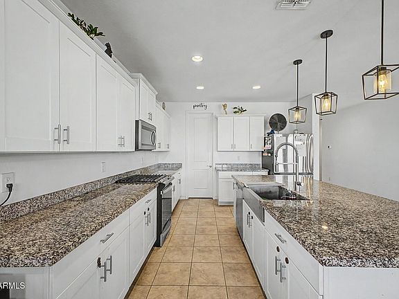 5th image of 11014 W MARGUERITE Avenue