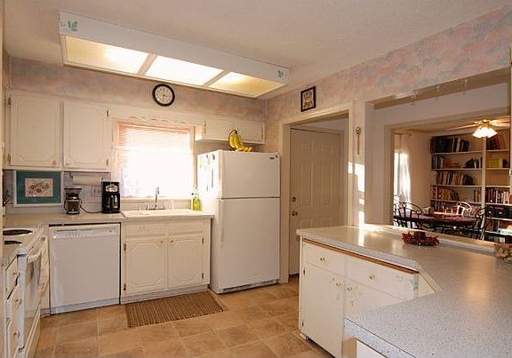 Kitchen with Hidden Custom Island.