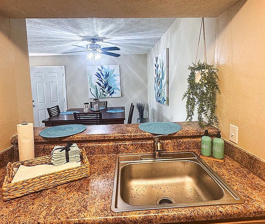 Keep an eye on things in the dinning room while you cook dinner.