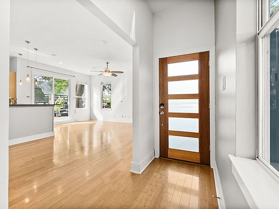 Front entry to spacious living room, dining and open floorpan kitchen