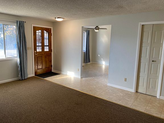 Living room, looking toward the dining room and kitchen.