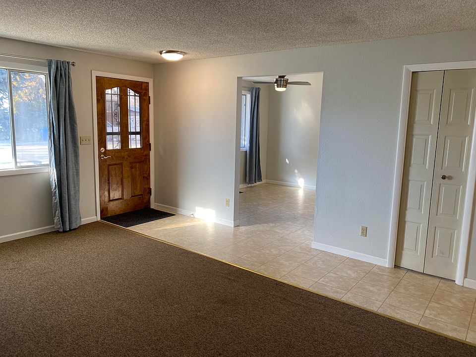 Living room, looking toward dining area and kitchen.