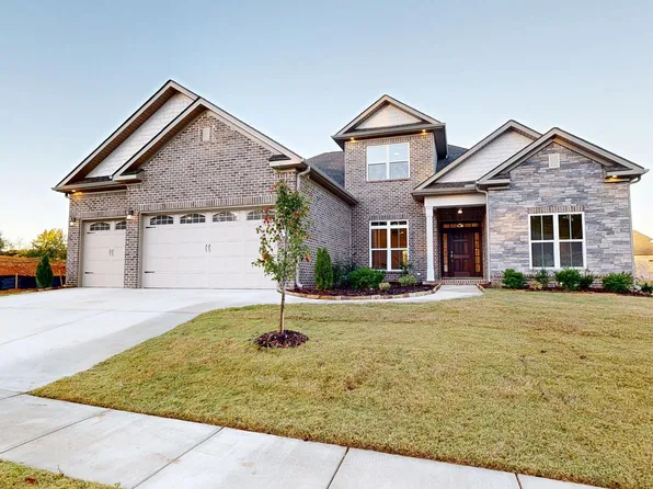 Jordan Plan with 3 Car Front Entry Garage Plan, Madison Branch