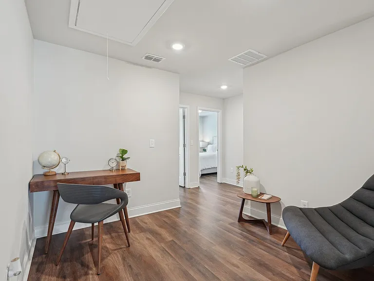Loft area ideal for family gatherings just steps from the upstairs bedrooms.