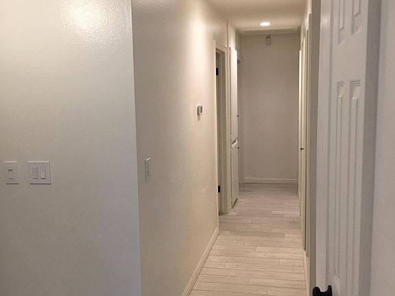 Down the Hall to Bedrooms & Baths