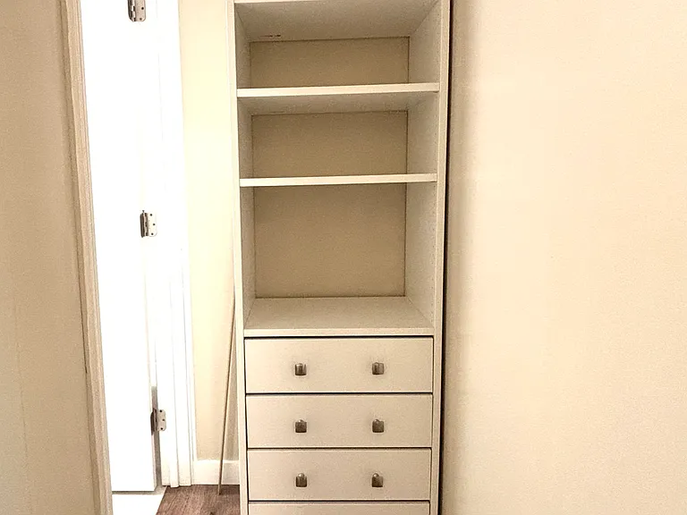 Hallway to Bathroom, with storage cabinet