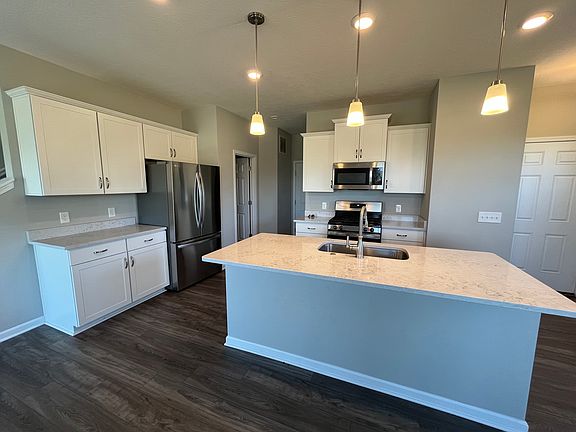 Quartz Countertops - stainless steel appliances