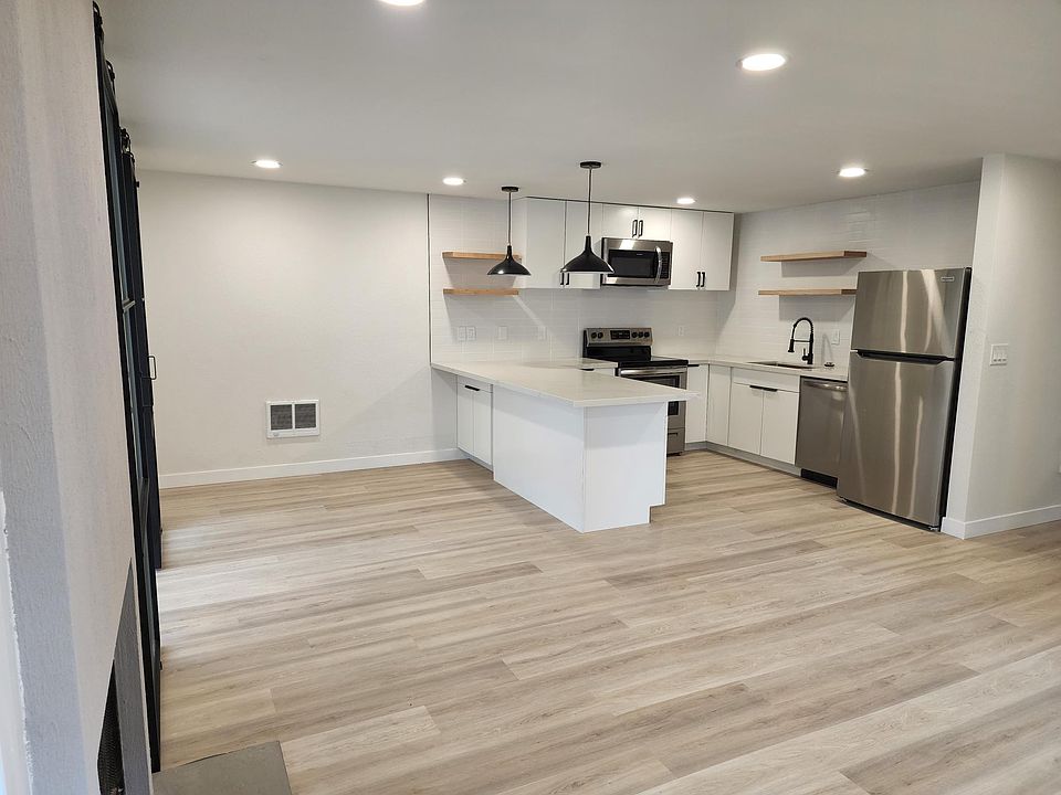 Remodeled kitchen, ample living spaced, and wood burning fireplace