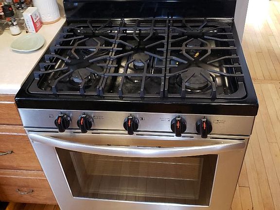 New Stainless appliances, 5 burner gas range