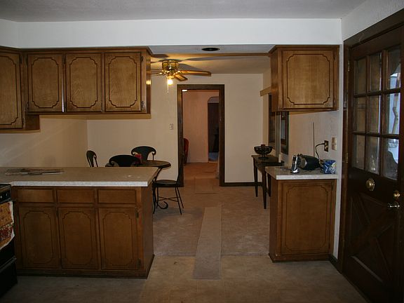 Dining Room w/Breakfast Bar in Kitchen