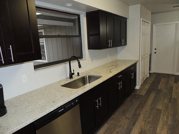 Kitchen, Granite Countertops, New Real Wood Cabinets, Dishwasher, Disposal, Gas Stove, Double Door Fridge