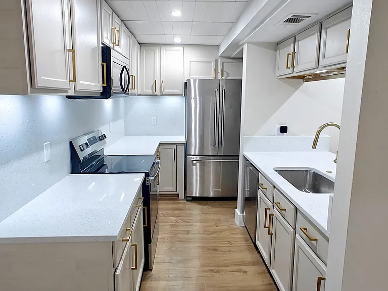 Gourmet kitchen with under cabinet lighting
