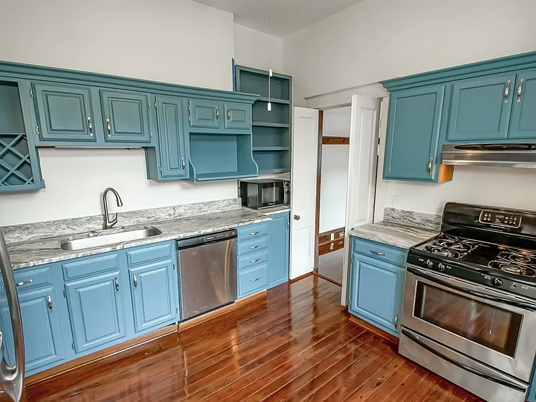 Kitchen. As of 2026, all new appliances (New Oven, New Dishwasher, New Fridge). Granite Countertops.