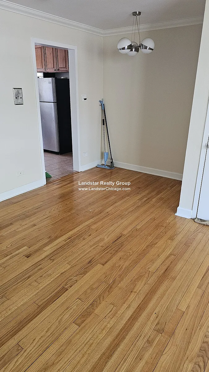 Building Photo - 6107 N Seeley Ave #2E