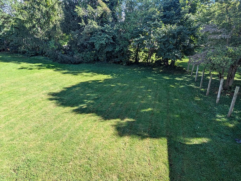 Large shared backyard with 2nd floor apartment. Great for Gardening, Corn Hole, Entertaining