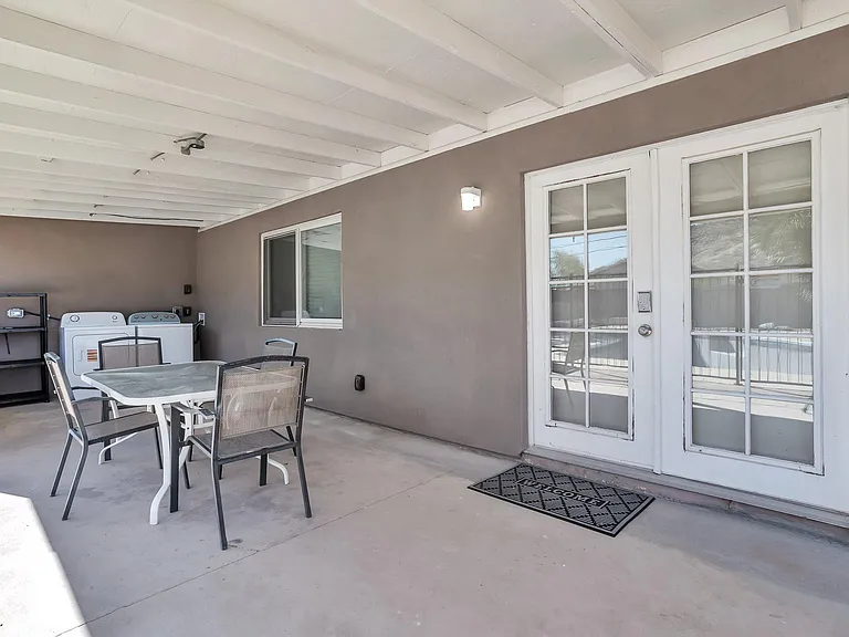 Back covered patio and lounge area