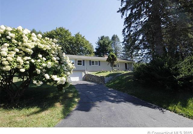 Ranch style home sits back ...