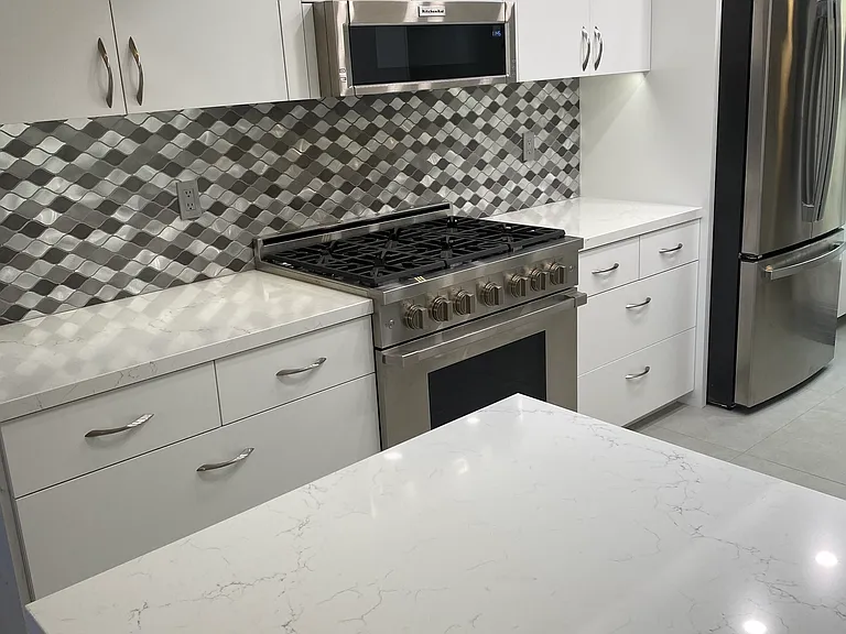 Chefs kitchen JUST completely rebuilt with Dacor 6 burner range/oven. Multiple counter spaces with quartz tops.