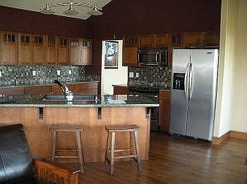Open Kitchen with stainless appliances