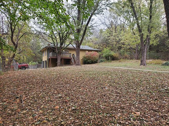 Large Fenced yard with 6 foot chain link fence.