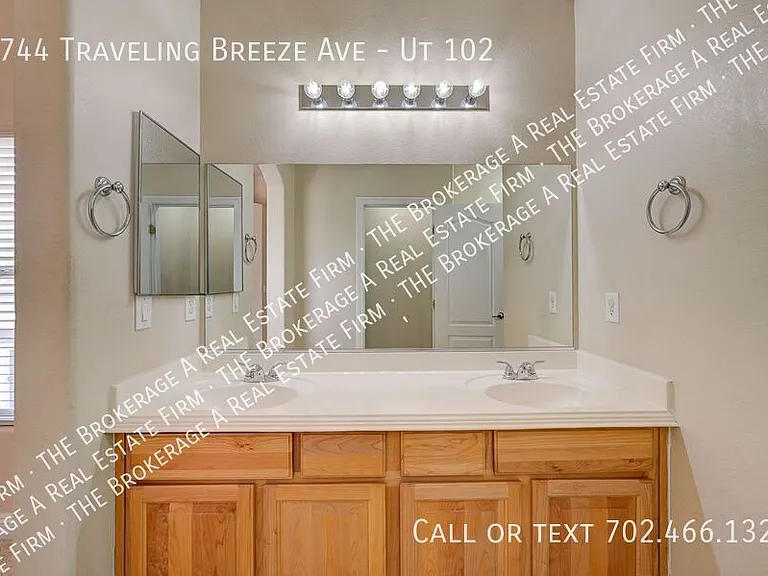 8744 Traveling Breeze Ave #102 — Photo 33