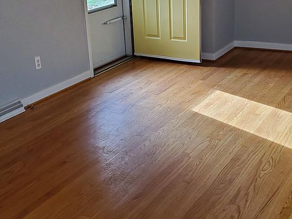 Living Room w/ Dining Area Hardwood Floors