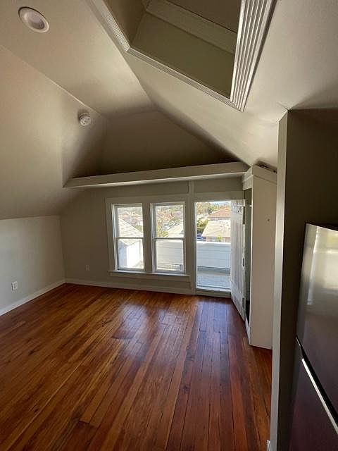 Living room with restored wood floors.