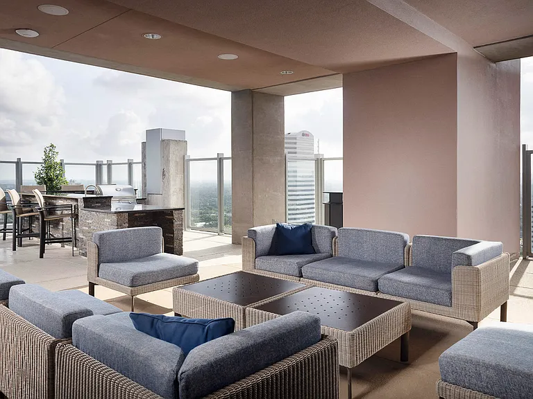 Rooftop comfortable seating, TVs and billiards table