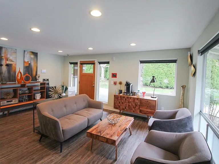 Spacious and bright living room in a Foster Creek residence, Tukwila WA, with open floor plan and sleek interior styling.