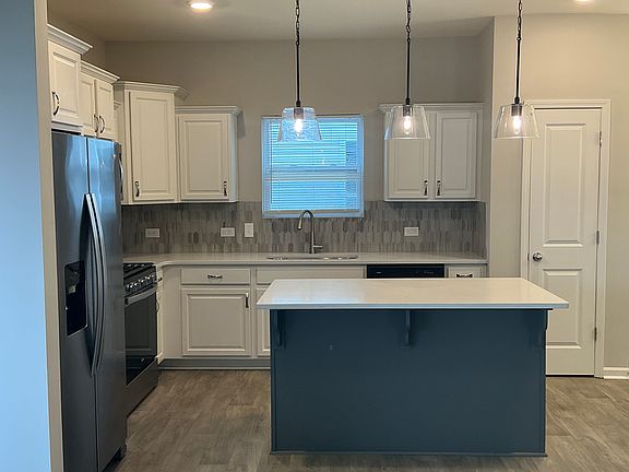 Open concept kitchen with island