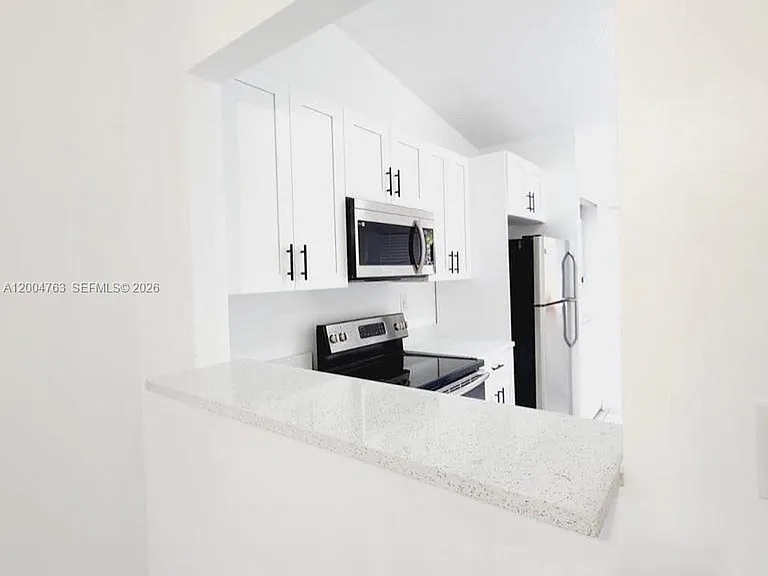 6960 NW 174th Ter #706 — Photo 9