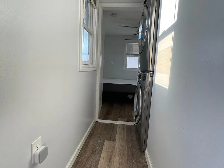 Brand new stacked washer and dryer.