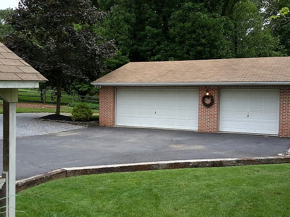 3-car garage w/brick facade