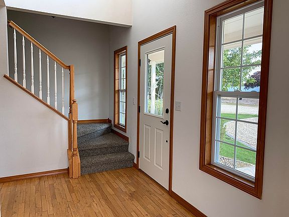 Entryway with hardwood floor