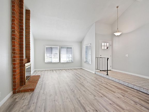 Unstaged living room & dining room