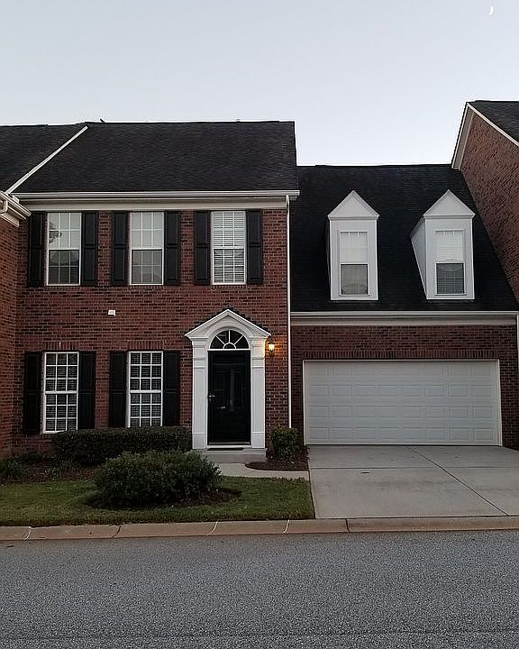 Front view. 2-car garage.