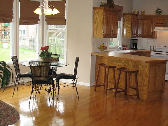 Eat-in kitchen looks out over the backyard