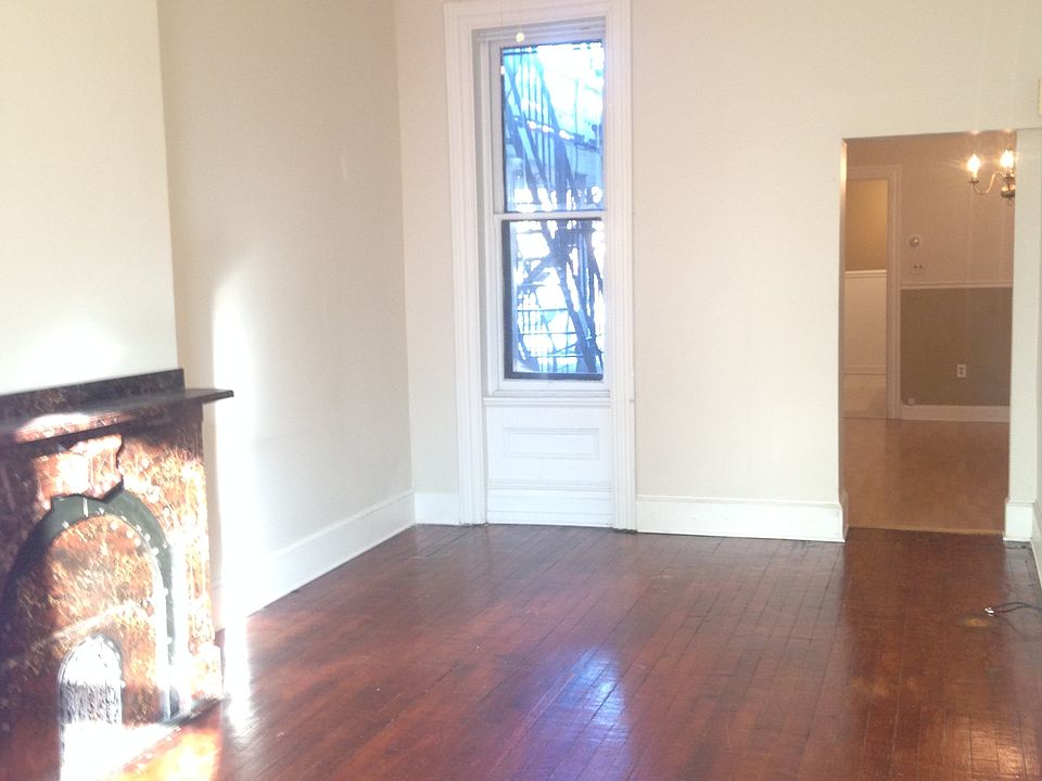 Living Room-large room w/ fireplace mantle