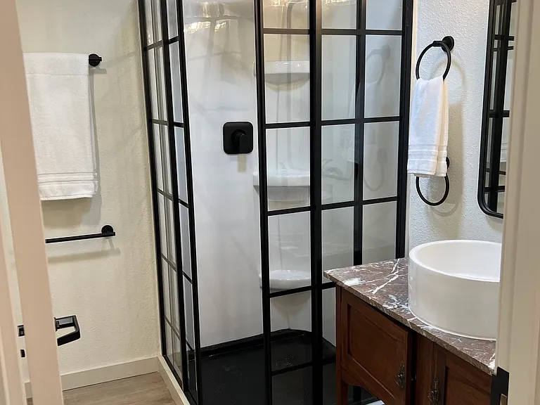 Bathroom adjacent primary bedroom.