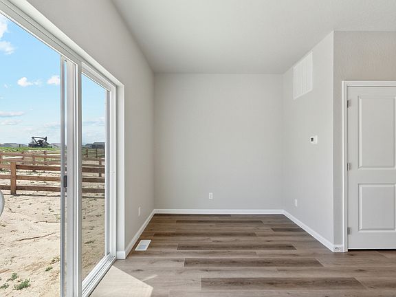 The sliding glass doors of the Platte let in great light and back yard views.