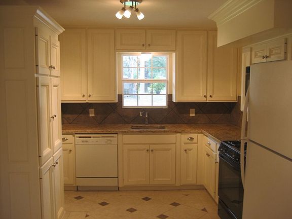Stunning kitchen with new granite and custom built-in cabinets