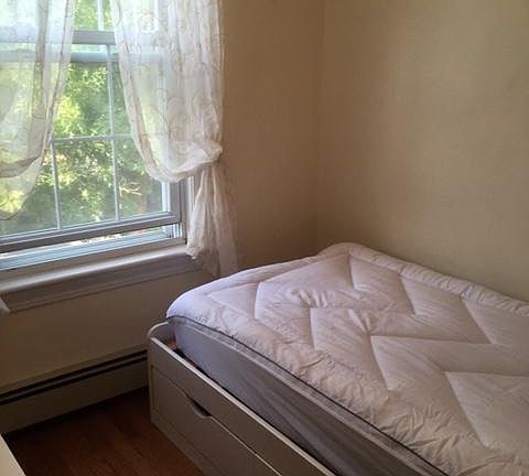 twin bed w/bed frame under bed storage and headboard w/shelving