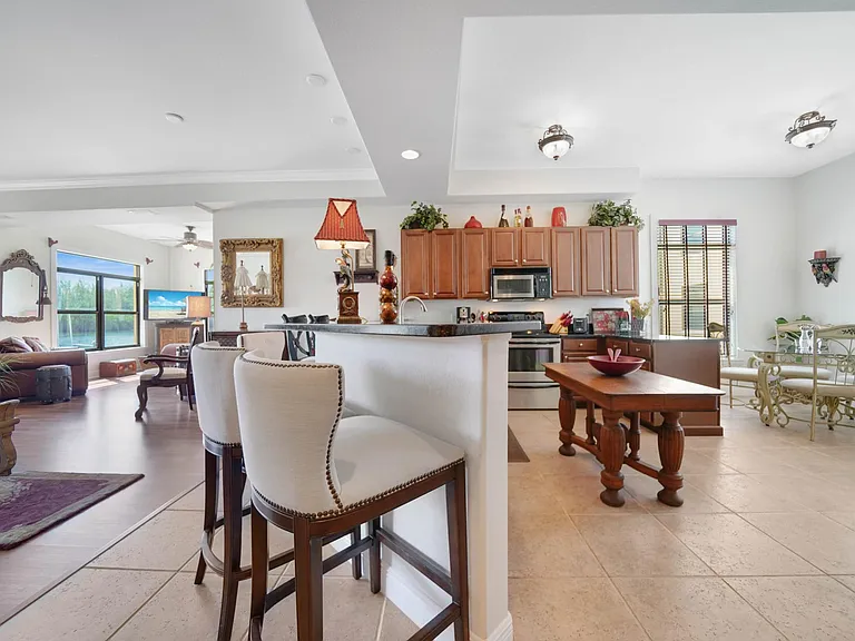 Den, bar, kitchen, dining.