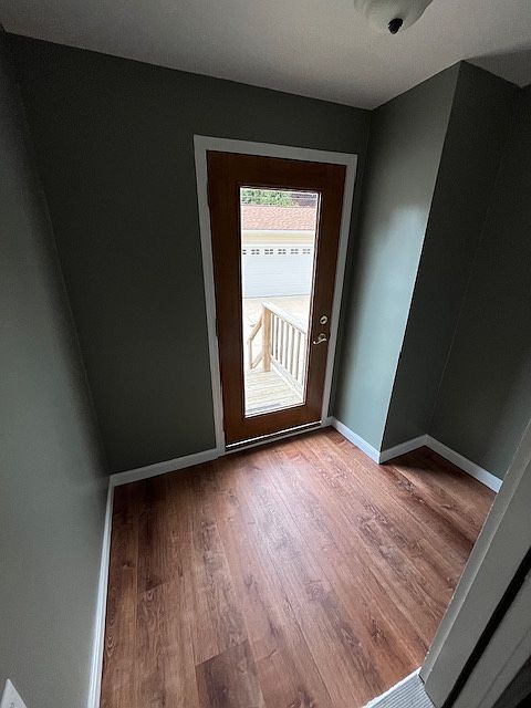 Mudroom in the back, back entrance to kitchen