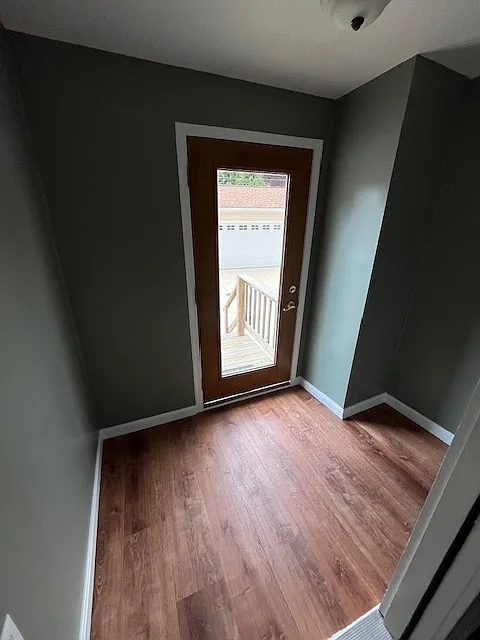 Mudroom in the back, back entrance to kitchen